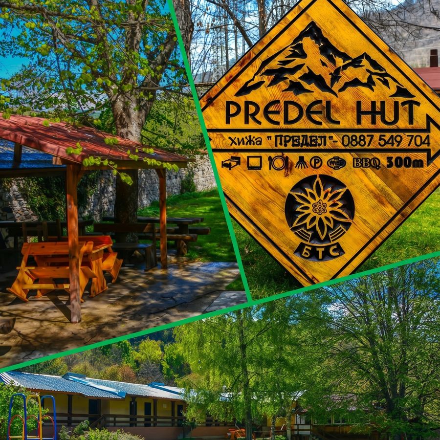 Predel Hut sign and the garden terrace